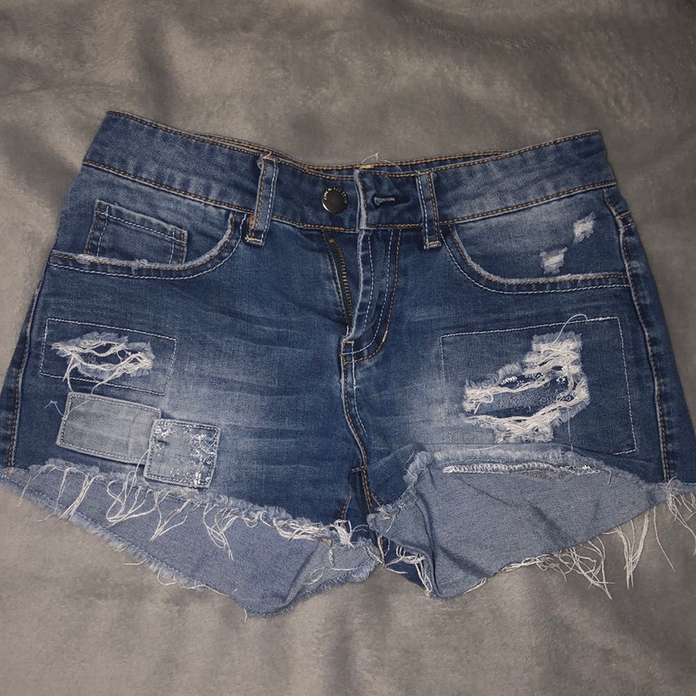 low rise distressed ardene shorts size 3